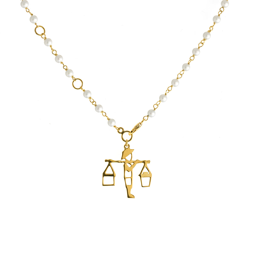 Cutout of Taho on a 24 inch pearl chain